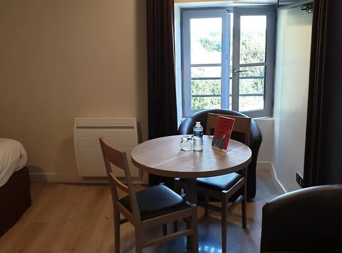 Appart hôtel L'hotellerie De La Toile à Beurre 3*